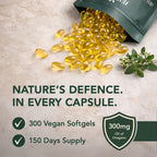 Open Nura Wild Oil of Oregano pouch with golden vegan softgels spilling out beside a sprig of oregano: 300 vegan softgels, 300mg oil of oregano per serving