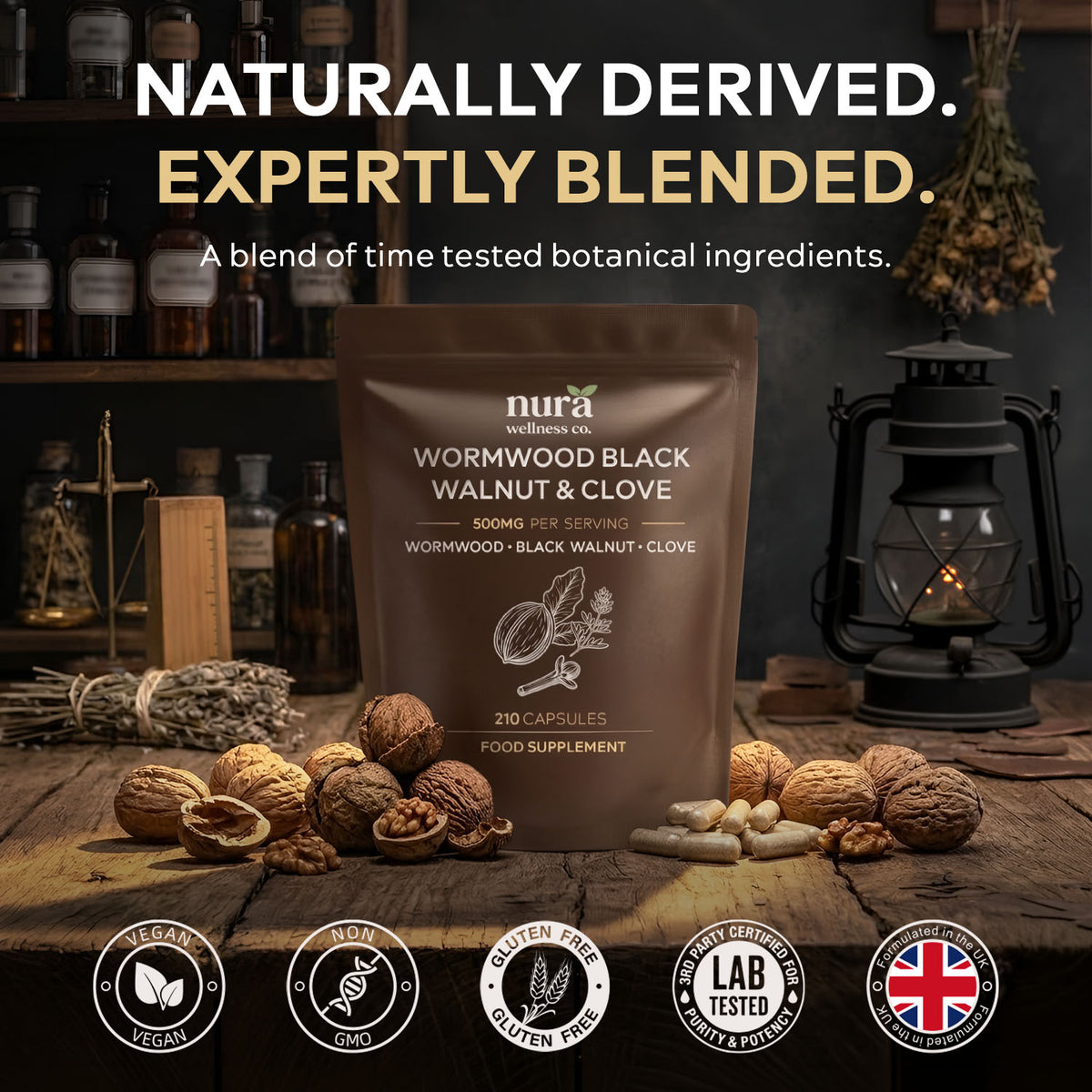 The three ingredients in wooden bowls: clove 100mg, black walnut 200mg and sweet wormwood 200mg per capsule